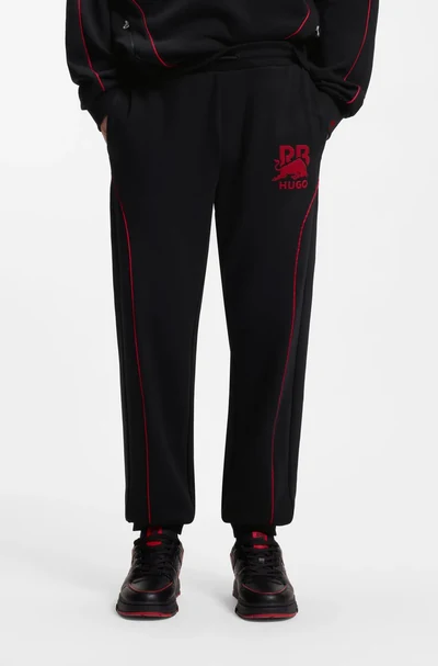 Hugo Boss HUGO HUGO x RB stretch-cotton tracksuit bottoms with bull motif, Black